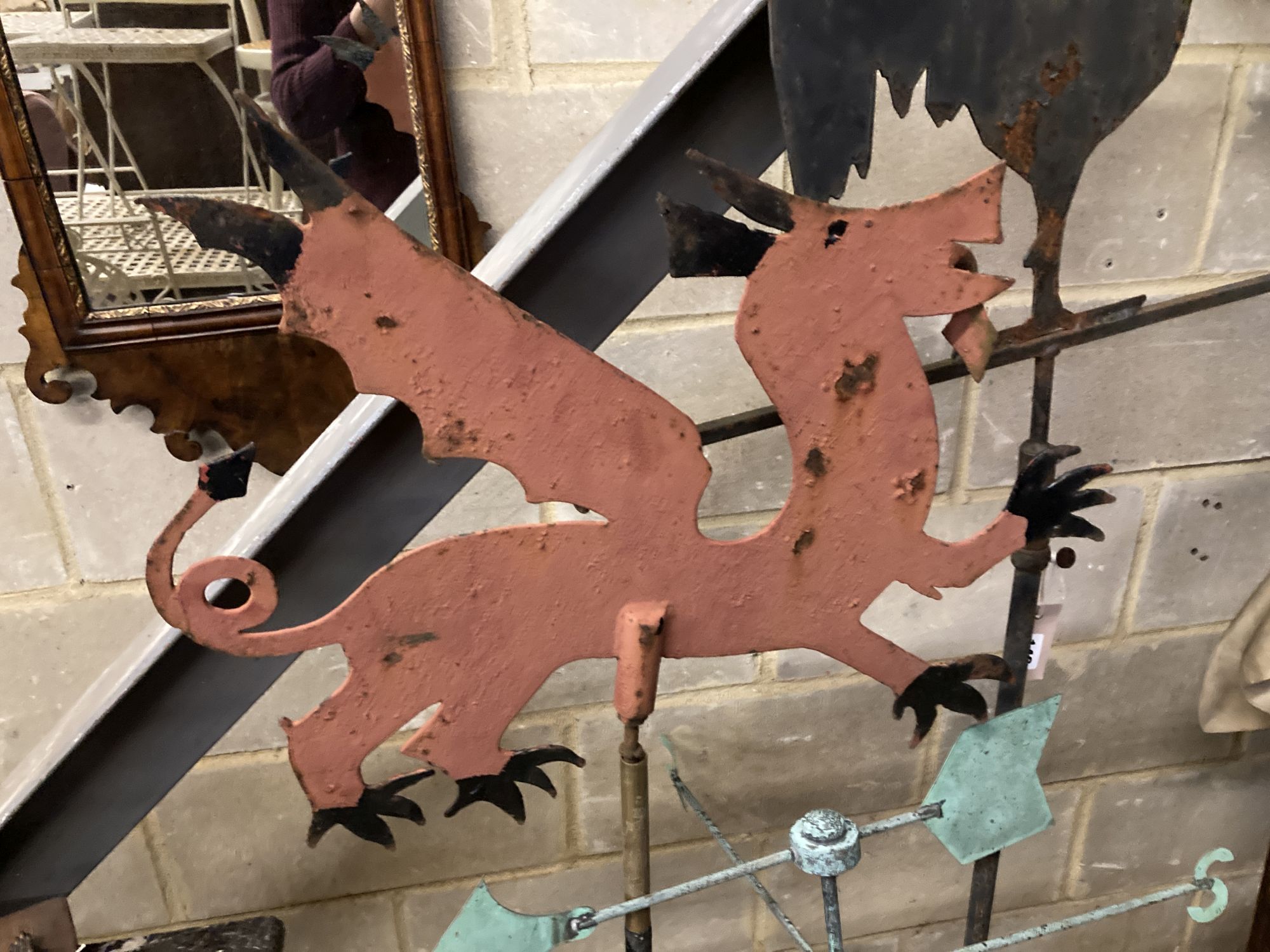 Three cast iron and metal weather vanes, largest 158cm high